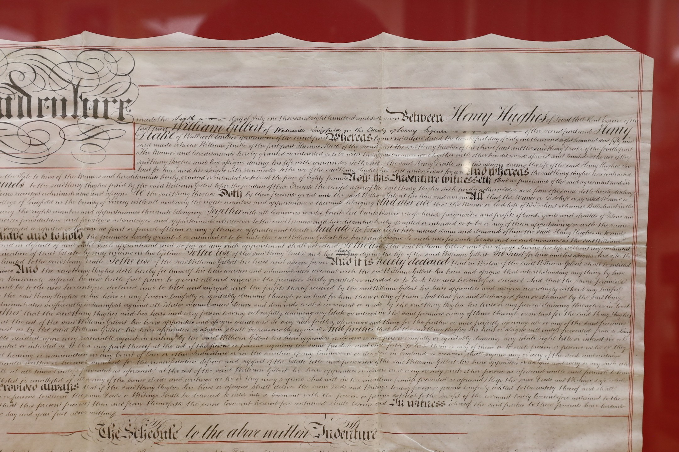 A framed 19th century indenture, for Henry Gilbert of Lingfield, 71 cms wide x 57 cms high.